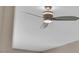 Modern ceiling fan with three blades and an LED light fixture centered on the white ceiling at 10348 Bressana Dr, Las Vegas, NV 89135