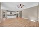 Open floorplan integrating the kitchen and living room areas for modern living at 10348 Bressana Dr, Las Vegas, NV 89135