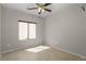 Bedroom featuring a window and ceiling fan at 1074 Wagon Trl, Mesquite, NV 89034