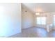 Spacious dining area with neutral walls, decorative lighting, and ample natural light at 11009 Hawk Valley Ave, Las Vegas, NV 89134