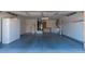 Spacious garage with custom cabinets and epoxy floor at 11009 Hawk Valley Ave, Las Vegas, NV 89134