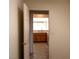 Charming kitchen features wood cabinets and tiled floors at 11009 Hawk Valley Ave, Las Vegas, NV 89134