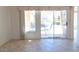 View from the living area of the outdoor space including patio furniture and greenery at 11009 Hawk Valley Ave, Las Vegas, NV 89134