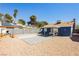 Large backyard with an outdoor grill and tiled patio that offer a blend of relaxation and entertainment at 1315 Chatsworth Ct, Las Vegas, NV 89142