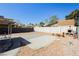 Well-maintained backyard with a patio, barbecue, and mature trees that offers opportunities for outdoor enjoyment at 1315 Chatsworth Ct, Las Vegas, NV 89142