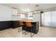Beautiful kitchen with modern appliances, countertops, and an island with barstool seating at 1315 Chatsworth Ct, Las Vegas, NV 89142