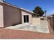 Backyard with gravel, privacy fence, a concrete patio, and access to the house at 1907 Thunder Storm Ave, North Las Vegas, NV 89032