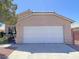 Charming single-story home with a two-car garage and low-maintenance desert landscaping in a quiet neighborhood at 1907 Thunder Storm Ave, North Las Vegas, NV 89032