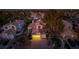An elevated view showcases this elegant home with a three-car garage and manicured grounds at 2104 Inverness Dr, Henderson, NV 89074