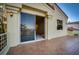 A spacious outdoor balcony with a sliding glass door that provides a seamless indoor-outdoor living experience at 2104 Inverness Dr, Henderson, NV 89074