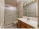 Bathroom features a shower with sliding glass door and a single sink at 2104 Inverness Dr, Henderson, NV 89074