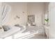 Bright staged bedroom featuring neutral tones, ample lighting and decor at 2104 Inverness Dr, Henderson, NV 89074
