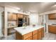 Kitchen features stainless steel appliances and oak cabinets at 2104 Inverness Dr, Henderson, NV 89074