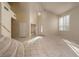Open-concept living space featuring high ceilings, large windows, and natural light at 2104 Inverness Dr, Henderson, NV 89074