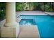 Close up of a sparkling pool with a spa and step entry at 2104 Inverness Dr, Henderson, NV 89074