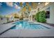 Beautiful backyard pool area with privacy fence at 2104 Inverness Dr, Henderson, NV 89074