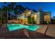 The pool and patio area offer a perfect space for outdoor entertainment and relaxation at 2104 Inverness Dr, Henderson, NV 89074