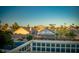 Neighborhood view with rooftops and distant mountains from the second-story balcony at 2104 Inverness Dr, Henderson, NV 89074