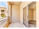 A balcony with railing overlooking trees at 2232 Aspen Mirror Way # 103, Laughlin, NV 89029