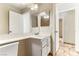 Bathroom with tile floors, modern vanity, and mirror at 2232 Aspen Mirror Way # 103, Laughlin, NV 89029