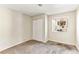 Bedroom with carpet, double sliding door closet, and a window at 2232 Aspen Mirror Way # 103, Laughlin, NV 89029