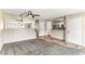 Open concept living room with a partial view of the kitchen at 2232 Aspen Mirror Way # 103, Laughlin, NV 89029