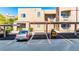 Reserved parking space with car and motorcycle in front of an apartment complex at 2232 Aspen Mirror Way # 103, Laughlin, NV 89029