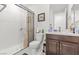 Modern bathroom with a walk-in shower, sleek vanity, and contemporary fixtures at 2243 Albury Ave, North Las Vegas, NV 89086