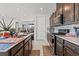 Bright kitchen with a stylish island, stainless steel appliances, and an open design at 2243 Albury Ave, North Las Vegas, NV 89086