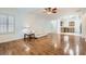 Bright and airy living area with wood floors, adjacent to the kitchen for convenient living at 2409 Garganey Ave, North Las Vegas, NV 89084
