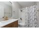 Clean bathroom with shower-tub combo, modern fixtures, and vanity sink at 257 N Lamb Blvd # E, Las Vegas, NV 89110
