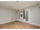 Bedroom featuring laminate wood flooring, a window, and neutral paint color at 257 N Lamb Blvd # E, Las Vegas, NV 89110