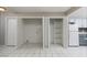 A shot of open closets located next to the kitchen area of this home at 257 N Lamb Blvd # E, Las Vegas, NV 89110