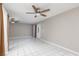 Bright living room features tile flooring and large windows at 257 N Lamb Blvd # E, Las Vegas, NV 89110
