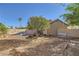 Low-maintenance backyard with mature tree and stone landscaping at 263 Baring Cross St, Henderson, NV 89074