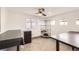 Spacious bonus room with natural light, ceiling fan, and wood-look tile flooring at 263 Baring Cross St, Henderson, NV 89074