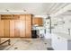 Well-organized garage with ample storage cabinets, utility sink, and extra freezer at 263 Baring Cross St, Henderson, NV 89074