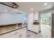 Bright kitchen featuring an eat in bar and connected to a large open-concept living space at 263 Baring Cross St, Henderson, NV 89074