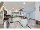 Well-lit kitchen with stainless steel appliances and wood tile flooring at 263 Baring Cross St, Henderson, NV 89074