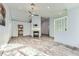 Large living room featuring wood tile floors, fireplace and an open concept layout at 263 Baring Cross St, Henderson, NV 89074
