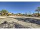 Street view of home with desert landscaping and a three car garage at 263 Baring Cross St, Henderson, NV 89074
