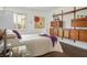 Bedroom featuring a bed with a decorative throw and built in shelves for storage at 2729 Echo Mesa Dr, Las Vegas, NV 89134