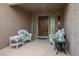 Cozy front porch with seating, creating a welcoming entrance to the home at 2729 Echo Mesa Dr, Las Vegas, NV 89134