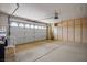 Spacious garage with an automatic door and built-in storage cabinets at 2729 Echo Mesa Dr, Las Vegas, NV 89134