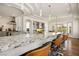 Kitchen with a large island and granite countertops and island seating at 2729 Echo Mesa Dr, Las Vegas, NV 89134