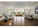 Bright living room featuring hardwood floors and abundant natural light at 2729 Echo Mesa Dr, Las Vegas, NV 89134