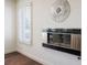 Living room with modern fireplace and plantation shutters at 2729 Echo Mesa Dr, Las Vegas, NV 89134