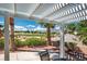 Relaxing covered patio with golf course views, ideal for outdoor dining and entertaining at 2729 Echo Mesa Dr, Las Vegas, NV 89134