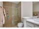 Bathroom featuring a stylish shower with glass door and tiled surround at 2729 Echo Mesa Dr, Las Vegas, NV 89134