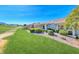 Beautiful backyard with manicured landscaping and golf course views at 2734 Grand Forks Rd, Henderson, NV 89052